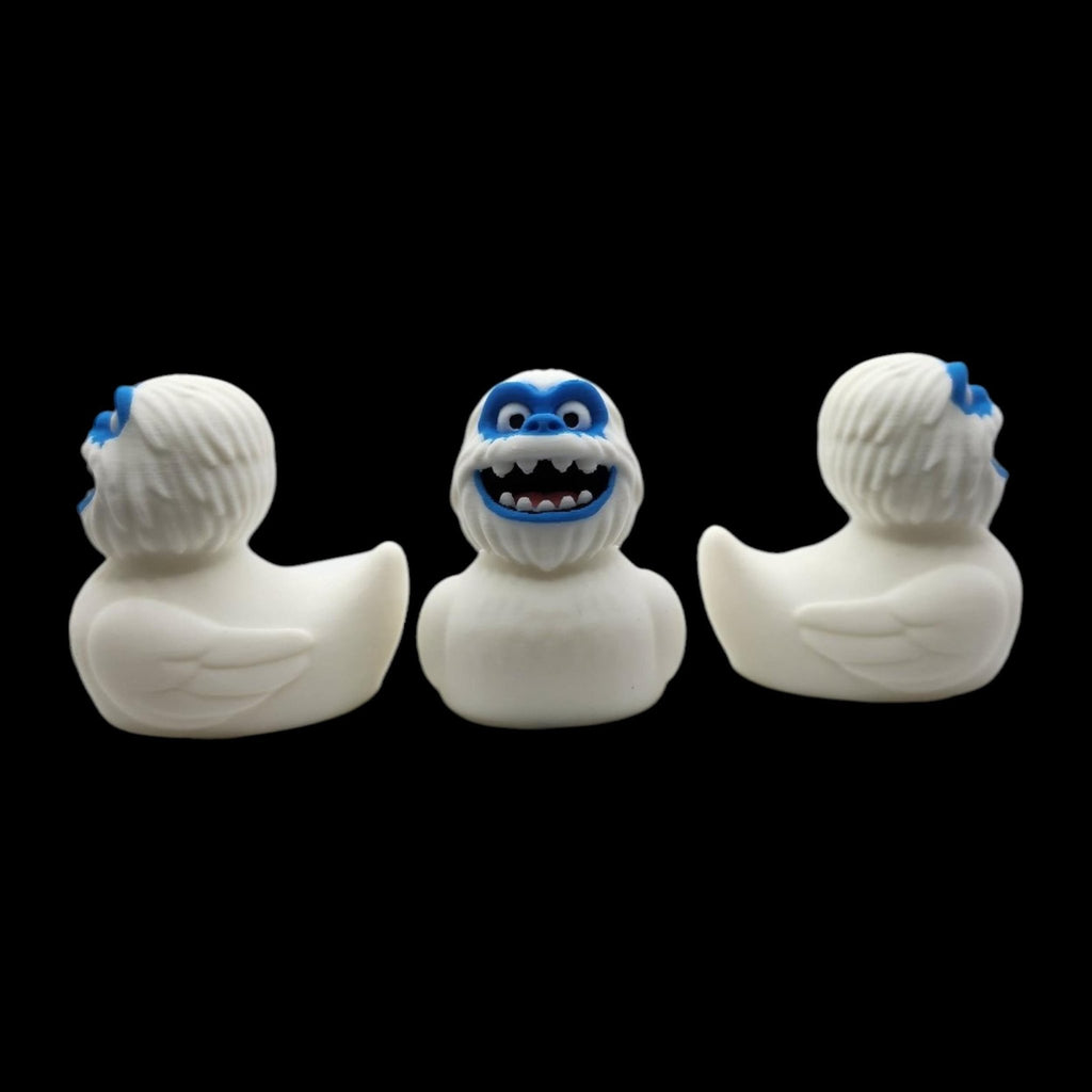 White 3D printed Yeti duck shown from the front and sides, highlighting its rounded body and raised tail.- JM Designs