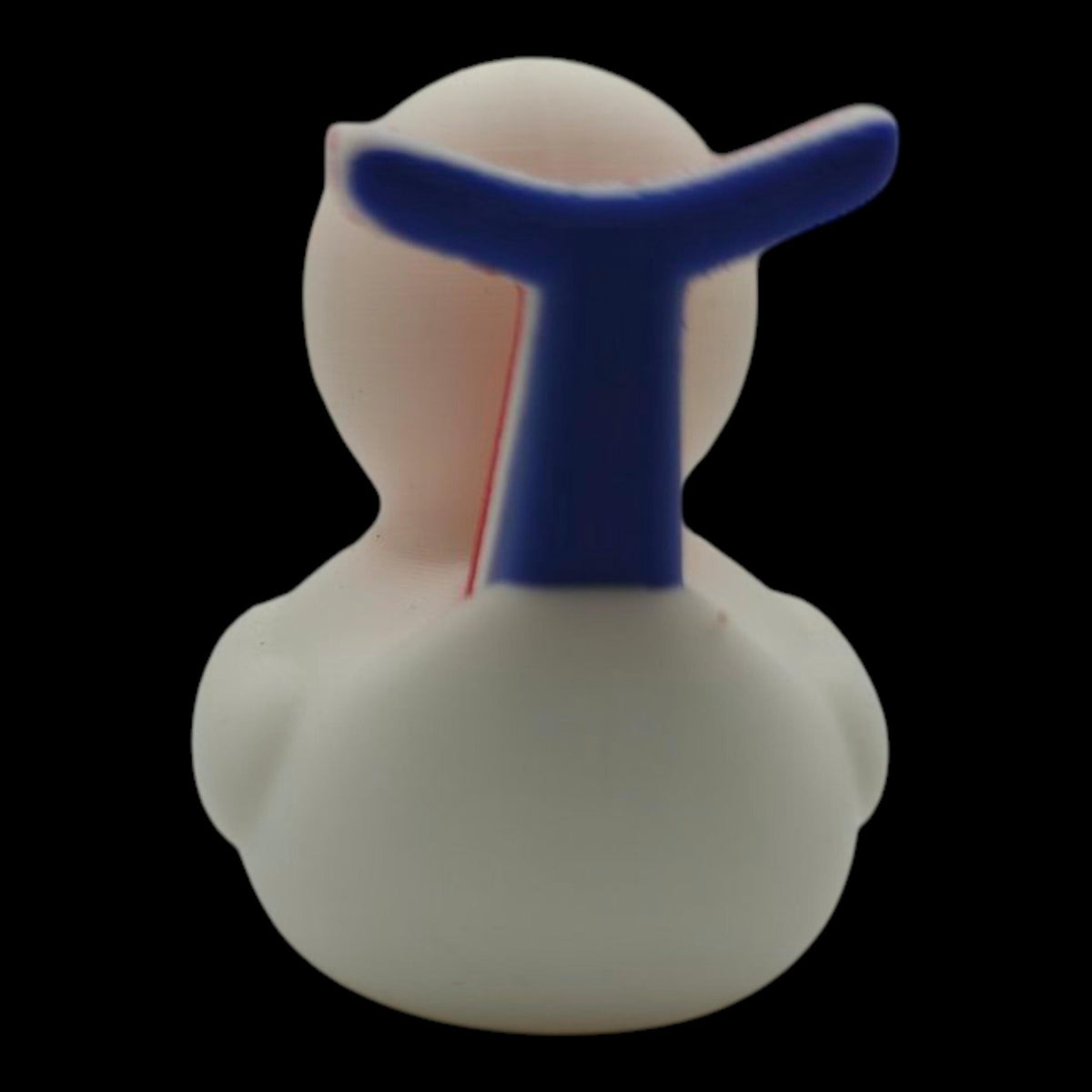 Back view of a white Carnival-inspired duck showing the blue rear of its whale-tail detail. - JM Designs