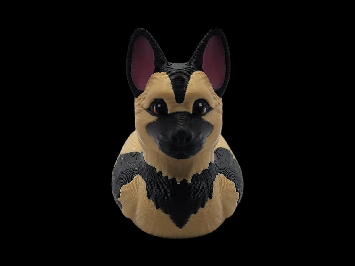 Front view of a black and tan 3D printed German Shepherd duck with upright ears.-JM Designs