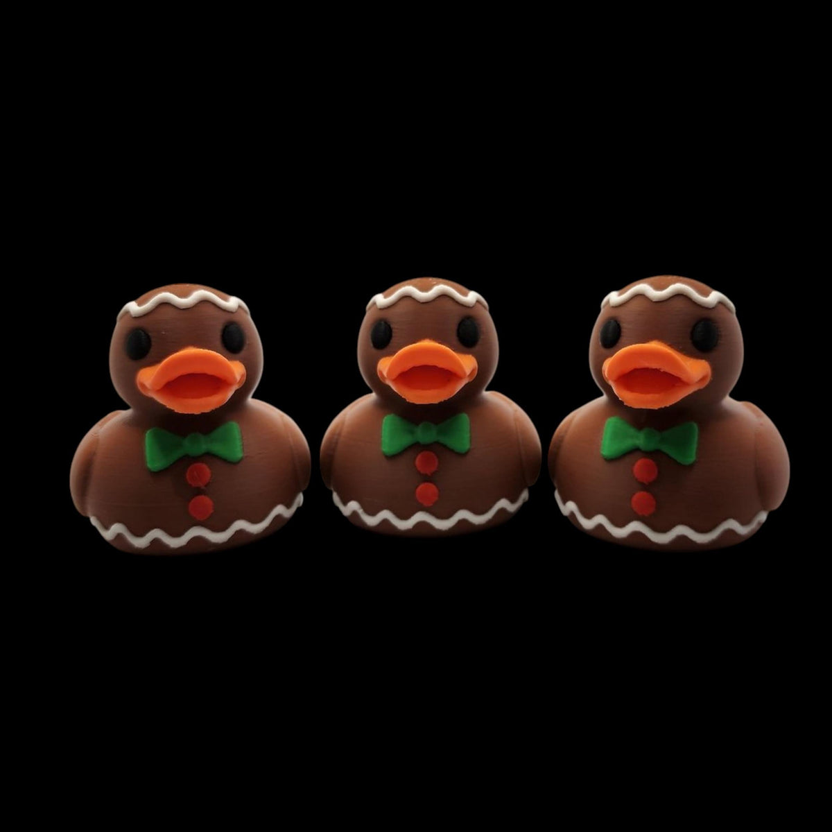 3D Printed Duck Gingerbread Design Christmas Bath Toy Holiday Themed Decoration Premium Filament Material Brown Body White Icing Details Orange Bill Black Eyes Green Bow Red Buttons Festive Bathroom Accessory Novelty Winter Gift Collectible