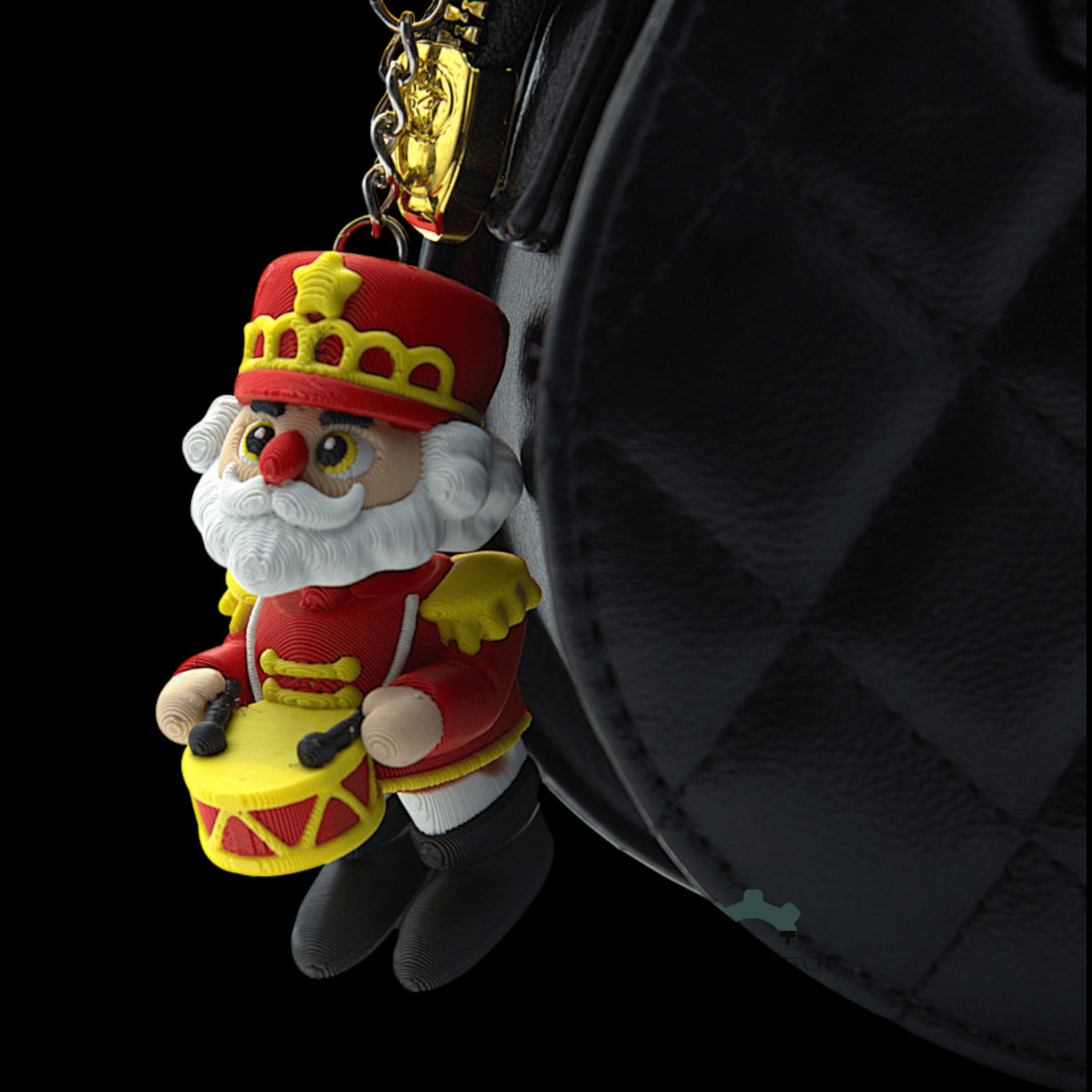 Miniature Collectible Nutcracker Articulated Santa Figure Christmas Keychain Holiday Decoration Festive Character Design Movable Arms Posable Creation Premium Material Construction Red Yellow Uniform Crown Hat White Beard Small Drum Detail