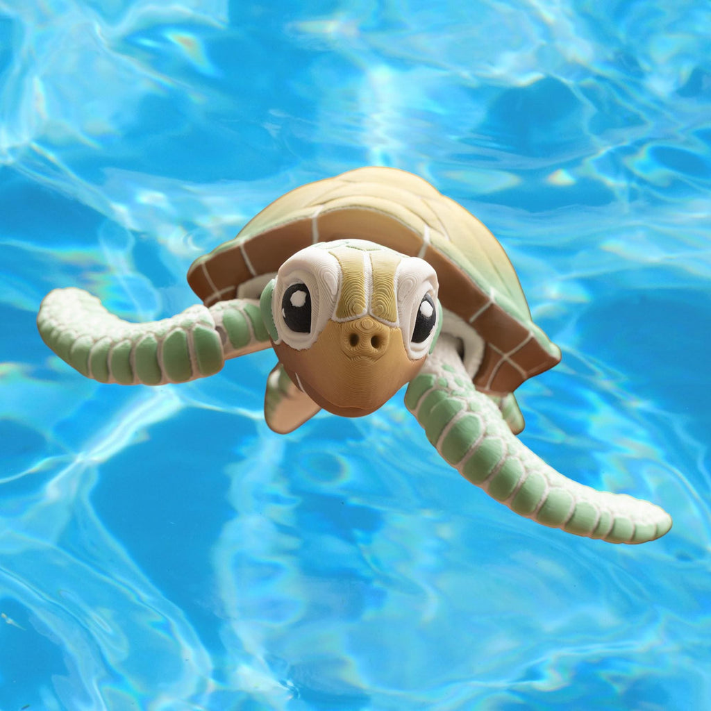 articulated sea turtle, turtle desk ornament, ornament marine decoration, decoration ocean themed, themed coastal display, display miniature model, model posable figure, figure movable toy, toy collectible item, item sensory fidget, fidget office accessory, accessory beach decor