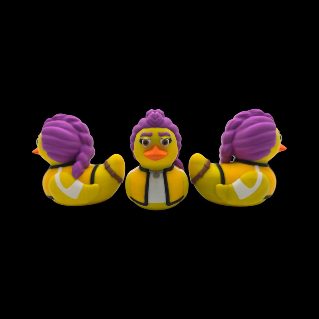 Rumi-inspired 3D printed duck figurine with purple hair, an orange beak and a yellow jacket. - JM Designs