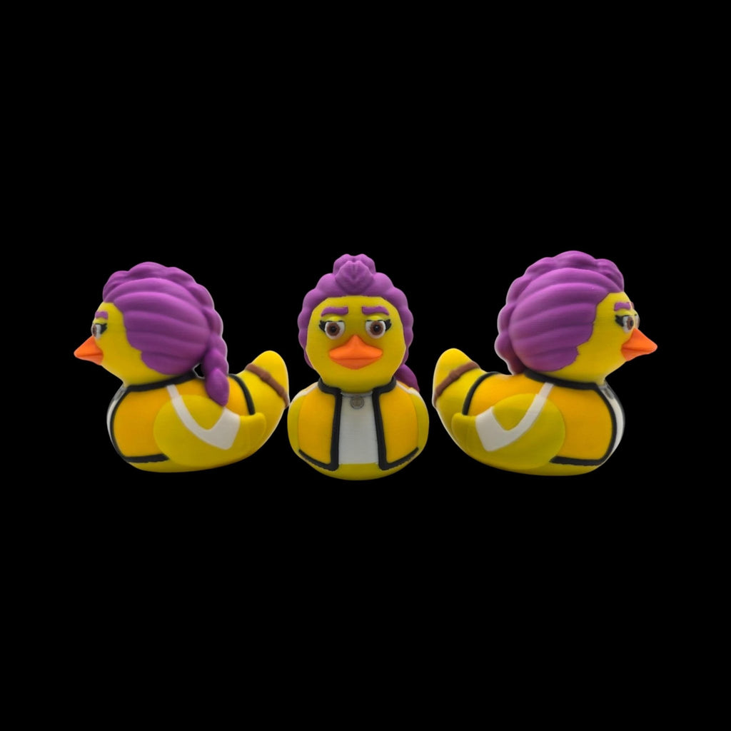 Rumi-inspired 3D printed duck figurine with purple hair, an orange beak and a yellow jacket.- JM Designs