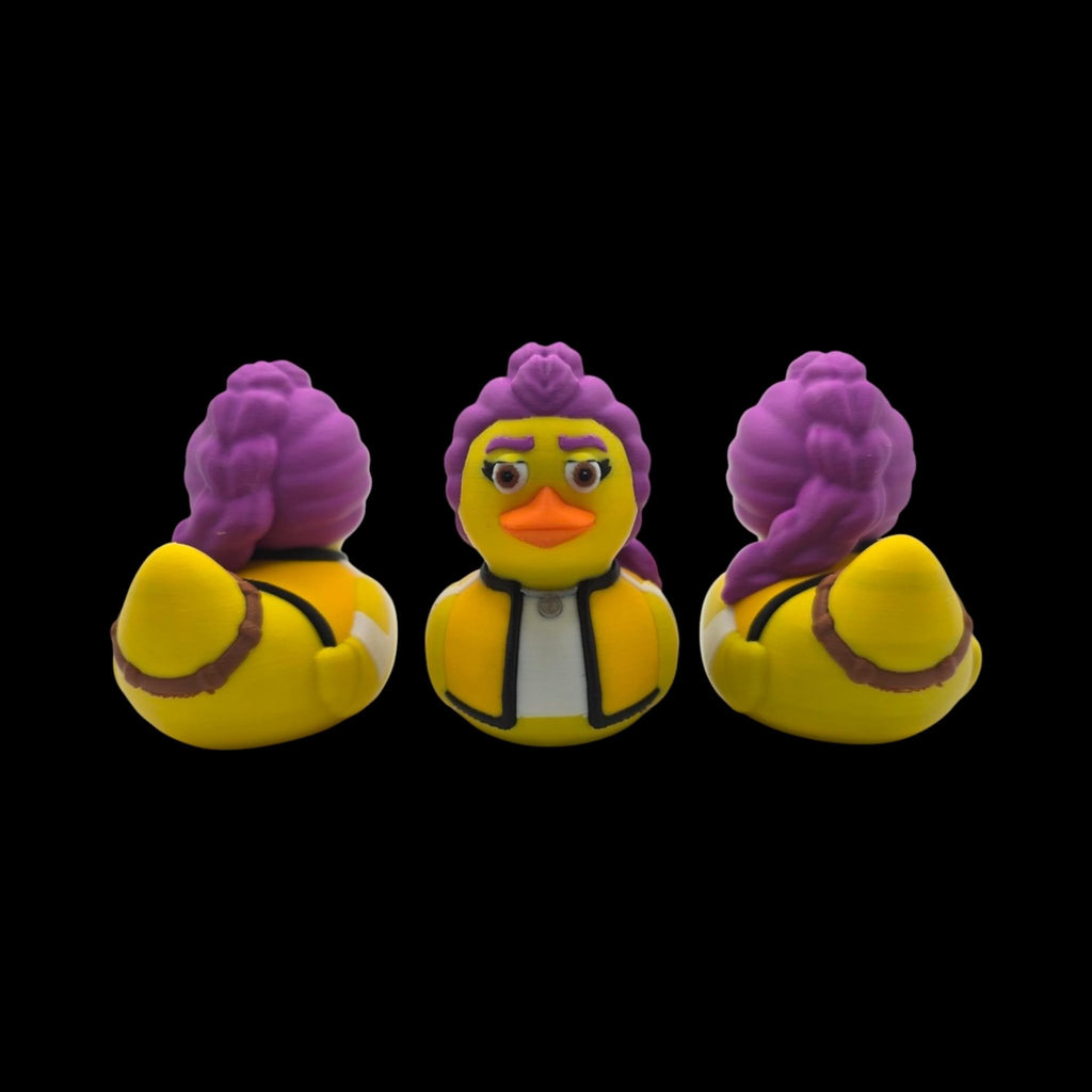 Rumi-inspired 3D printed duck figurine with purple hair, an orange beak and a yellow jacket.- JM Designs