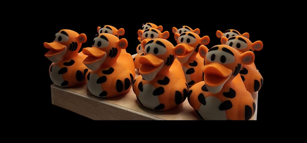 Tigger-inspired 3D printed orange striped duck figurine - view 8