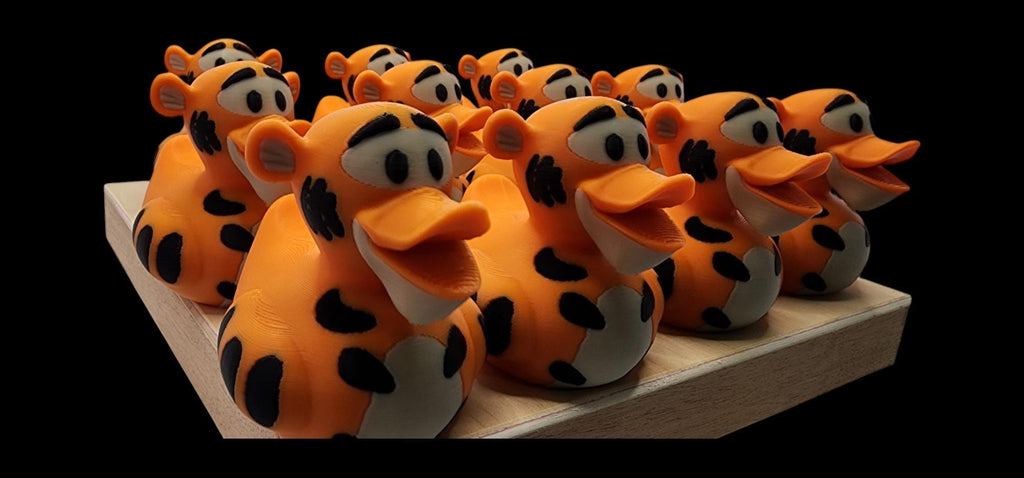 Tigger-inspired 3D printed orange striped duck figurine - view 7