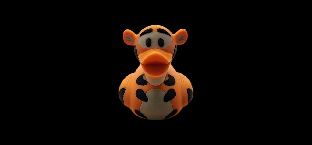 Tigger-inspired 3D printed orange striped duck figurine - view 1