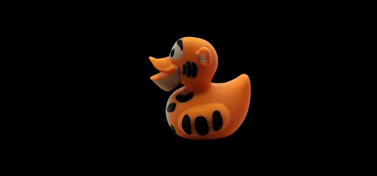 Tigger-inspired 3D printed orange striped duck figurine - view 2